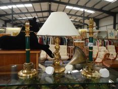 A pair of candlestick style table lamps and 1 other