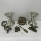 A mixed lot including candle holders, letter racks, inkwell etc.