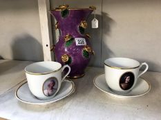 2 rare Norwegian Porsgrund cups and saucers and an art pottery purple vase with gold flower detail