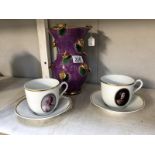 2 rare Norwegian Porsgrund cups and saucers and an art pottery purple vase with gold flower detail