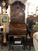 A 20th Century bureau with display cabinet