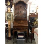 A 20th Century bureau with display cabinet