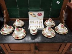 A Royal Albert Country Roses tea set and spoon set