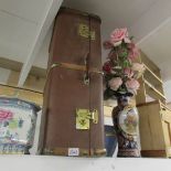 A large vintage travel trunk.