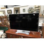 A Panasonic 42" flat screen TV