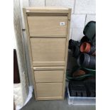 A pair of beech effect 2 drawer filing cabinets