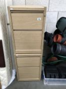 A pair of beech effect 2 drawer filing cabinets