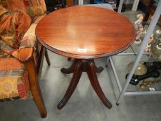 A darkwood stained side table