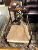 A Victorian inlaid carver chair