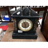 A slat mantel clock for restoration