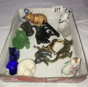 A good collection of small cat figurines