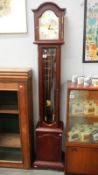 A modern Tempus Fugit Acctim darkwood stained longcase clock