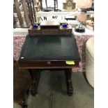 A Victorian mahogany davenport desk