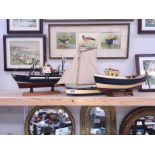 3 wooden models of a fishing trawler,