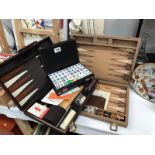 2 backgammon sets, mah jong set, dominoes etc.