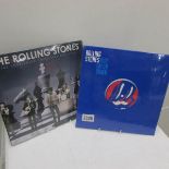 2 Rolling Stones records in original packaging.