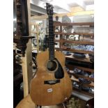 A Yamaha acoustic model FG410A guitar