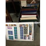 A large quantity of British stamps in 11 albums (some empty)