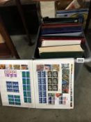 A large quantity of British stamps in 11 albums (some empty)