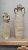 Two old stoneware two handled flasks