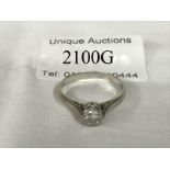 An 18ct white gold solitaire diamond ring