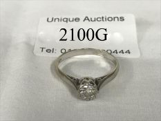 An 18ct white gold solitaire diamond ring
