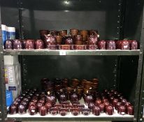 2 shelves of Grayshott pottery table ware including salt and pepper pots etc.