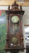 A mahogany cased double weight wall clock.