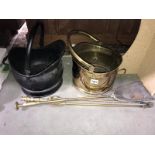 2 coal buckets and 2 brass fire irons