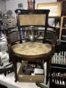A mahogany inlaid chair on casters (upholstery requires attention)