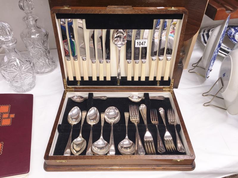 A boxed canteen of cutlery (44 pieces)