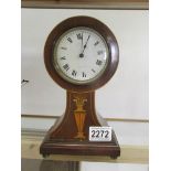 A good Edwardian mahogany inlaid mantel clock, in working order.