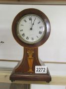 A good Edwardian mahogany inlaid mantel clock, in working order.
