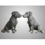 A pair of cast metal Labrador dog garden figures.