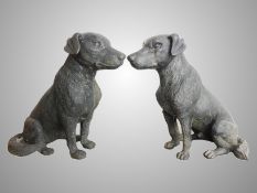 A pair of cast metal Labrador dog garden figures.