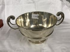 A silver two handled bowl inscribed Daphne and Dagfly 1911 HM London 1907 Joseph Heming & Co 616g