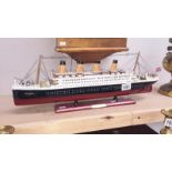 A wooden model of The White Star Line ocean liner Titantic approximate length 21.