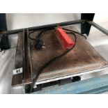 An electric tile cutter