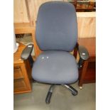 A blue fabric office chair