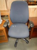 A blue fabric office chair