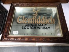 A Glen Fiddich framed advertising mirror