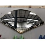 A large Art Deco style fan shaped mirror