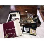A large old mahogany box full of assorted jewellery