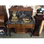 An ornately carved marble topped wash stand - rear leg trolley wheel missing A/F