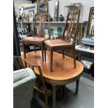 A Nathan dining table and 6 chairs