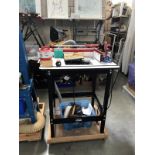 A Jessem Rout-R-Lift router table with fitted Freud 1900W router
