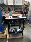 A Jessem Rout-R-Lift router table with fitted Freud 1900W router