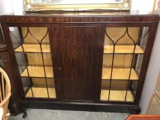 A mahogany display cabinet