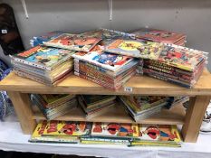 A collection of annuals including approximately 48 Dandy, 17 Beezer,