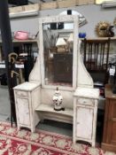 A shabby chic painted dressing table